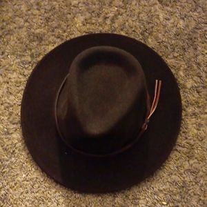 Brown Fedora with a brown strip rapped around the top.